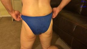 oiled stud does workout in man-thong