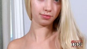 Petite blonde teen looks like a mermaid when she undoes her hair and gets naked