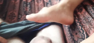 Perfect footjob while lying in the hammock