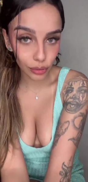 Hot teen with big tits shows off her ass on OnlyFans