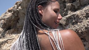 Beautiful and Tanned Girl Sucking a Loaded Dick on a Beach
