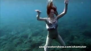 Nastya swimming nude in the sea