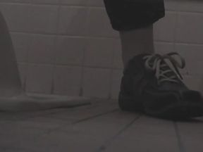 Spy device installed in a public toilet cabin