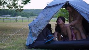 Asian bitch getting her pussy pounded in a tent in the open field