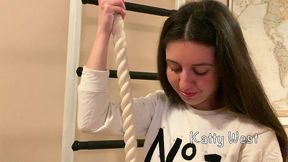 skinny russian babe katty west makes exercises on the wall-mounted ladder