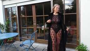 A Mature Woman Shows off Her Figure Outside in a Lace Bodysuit!