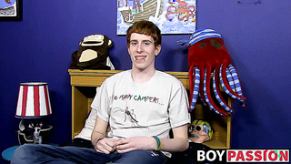 Guy with red hair gets interviewed before a solo session