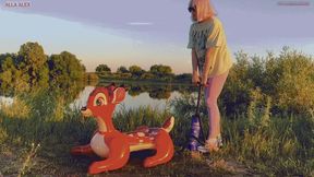 Alla tightly inflates the inflatable Bambi with a hand pump