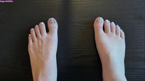 sage eldritch painting her toenails holographic [sfw]