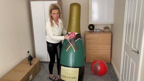 Giant champagne bottle sit pop HD