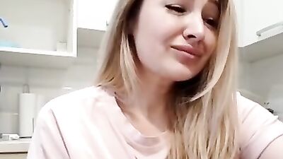 Full-bosomed babe squeezes her big natural tits for us