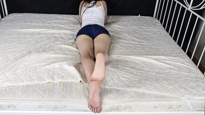 Beautiful Angelina shows off her stunning feet on the bed (Part 4 of 6)