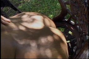 Hot busty African chic gets fucked from behind under a tree