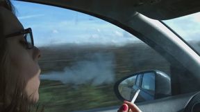 Chloe Toy smoking while being driven to the shoot