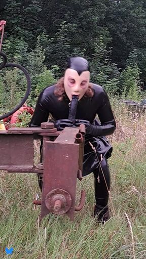 Latex Sissy Sucks A Dildo In The Wild