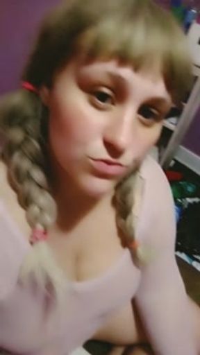 Smoking a cigarette in pink with braids