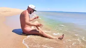 Nudist Couple Having Pegging Session on the Beach