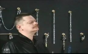 Leather wearing sub gets dominated by her masked master