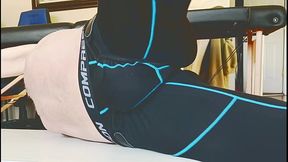 Stop Action Stretching on Table in Compression Tights and Groin Brace