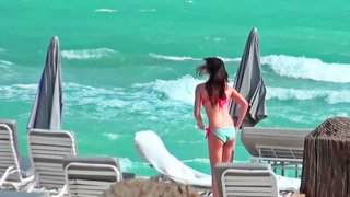 Petite babe is caught at the beach and is brought inside