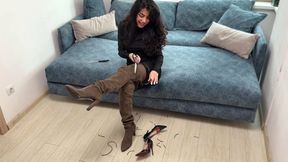 Stuart Weitzman's boots are destroyed, completely destroyed, totally ruined boots, ruined suede boots, knee-high boots ruined, girl's ruined boots.