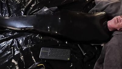 Cocooned in Latex and Teased with Buzzing Toys
