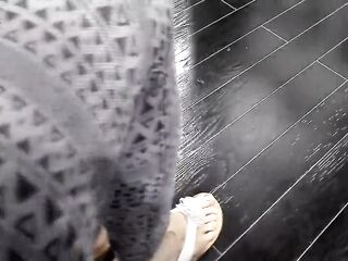 Shoeplay and Dangling in Cute White Flip Flops in a Store