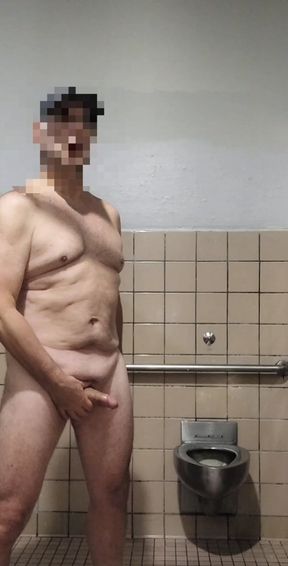 Exhibitionist old guy naked and masturbating in public men&#039;s room (again)