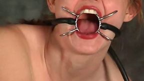 Cute bitch sucks a dildo in a cellar and gets her cunt fucked