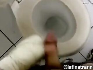 Nikki Montero transgender pornstar ladies room pissing on the throne-room and being silly