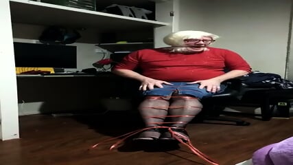 DAISY TIED TO A CHAIR