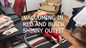 MISTRESS VACUUMING IN RED AND BLACK SHINNY LEATHER