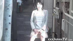 ”Japanese female shows off ass & twat”