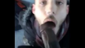 White guy sucking a big fat black cock outside