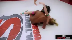 Ebony wrestling lez dominates over loser with strapon