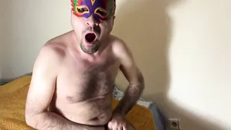 Hairy bear Mr. Grin strips and strokes his hard cock