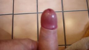 Masturbation and quick cumshot - close-up in the bathroom