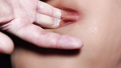 Picking at her pussy, practicing.