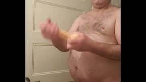 Nude Martin Lavall&eacute_e lubricates, kisses and engulfs his big 8 inch dildo