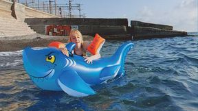 Fucking an inflatable shark on the waves of the sea near a deserted beach!!!