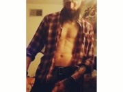 Bearded muscular guy jerking off cums and eats it
