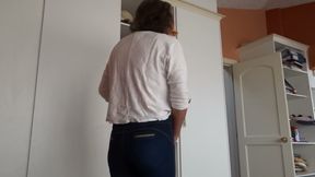 After Urinating, the Stepmother Puts on Very Tight Jeans, Revealing Her Panties