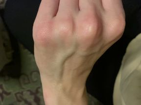 Veiny Hands Near the Heater