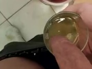 Boy drinks his own piss