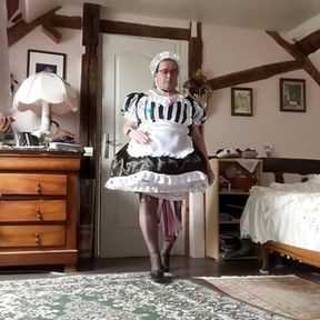 In a white and black maid outfit for a day