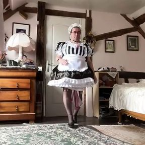 In a white and black maid outfit for a day