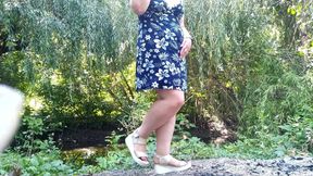 Peeing standing through pink panties in nature