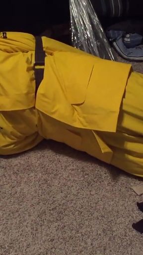 Thrilling moment from "Yellow PVC Rainsuit Self Bondage"