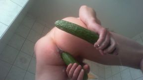 Ass fucked with cucumbers and weighted it