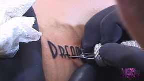 She gets dream girls tattooed on her nice ass